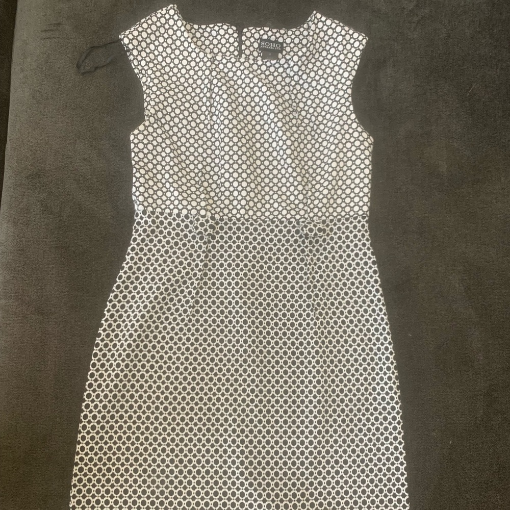 Very Cute, black & white dress. This dress has belt loop holes and a small split